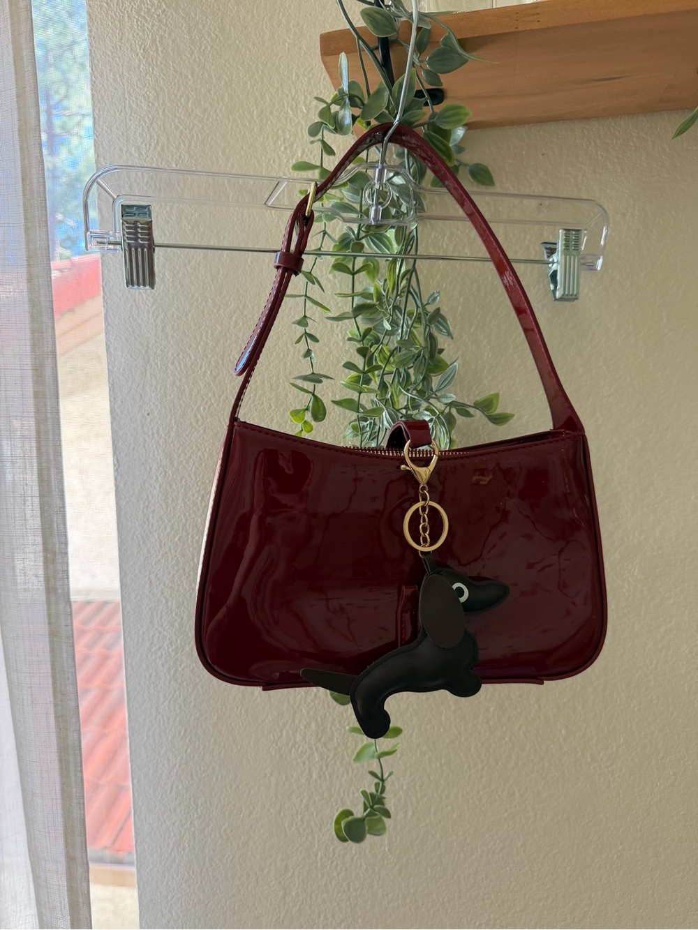 Patent Leather Shoulder Bag in Deep Burgundy with dachshund keychain